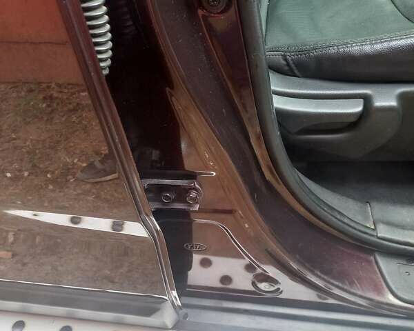 Красный Киа Соренто, объемом двигателя 2.4 л и пробегом 179 тыс. км за 12600 $, фото 19 на Automoto.ua