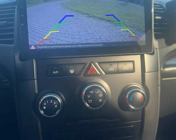 Червоний Кіа Соренто, об'ємом двигуна 2.36 л та пробігом 249 тис. км за 9999 $, фото 13 на Automoto.ua