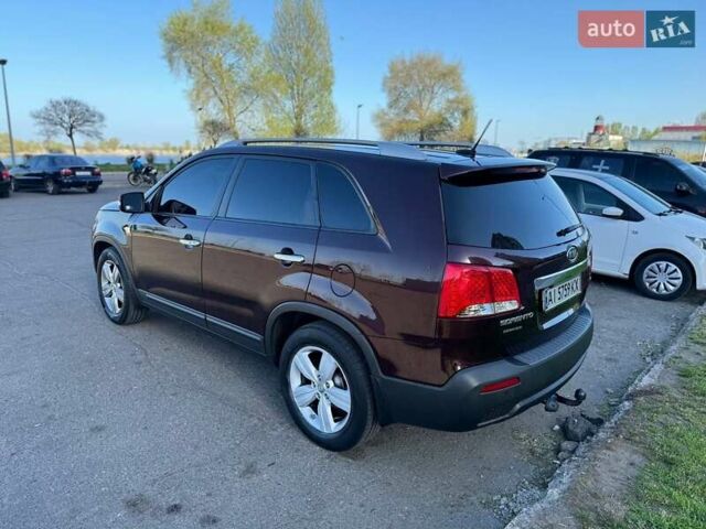 Красный Киа Соренто, объемом двигателя 2.35 л и пробегом 169 тыс. км за 14000 $, фото 31 на Automoto.ua