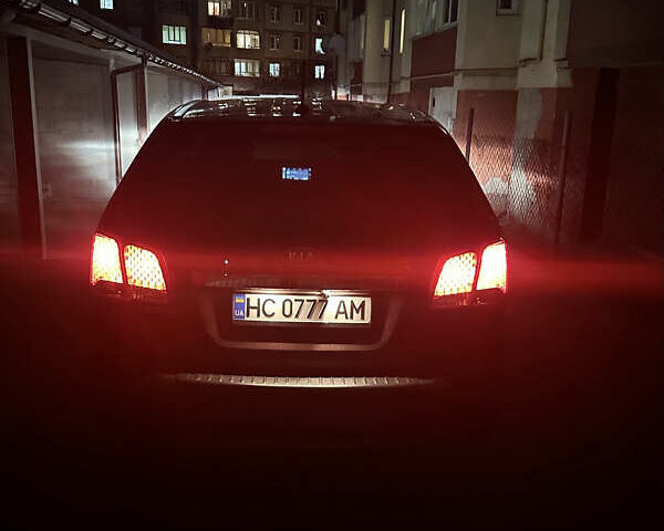 Червоний Кіа Соренто, об'ємом двигуна 2.36 л та пробігом 249 тис. км за 9999 $, фото 9 на Automoto.ua