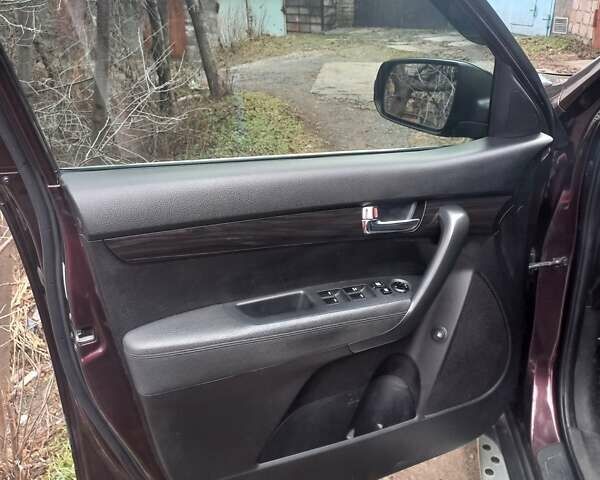 Красный Киа Соренто, объемом двигателя 2.4 л и пробегом 179 тыс. км за 12600 $, фото 14 на Automoto.ua
