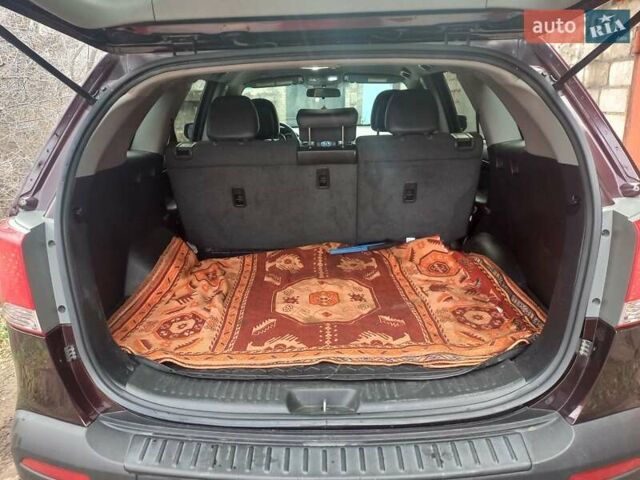 Красный Киа Соренто, объемом двигателя 2.4 л и пробегом 179 тыс. км за 12600 $, фото 22 на Automoto.ua