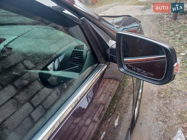 Красный Киа Соренто, объемом двигателя 2.4 л и пробегом 179 тыс. км за 12600 $, фото 4 на Automoto.ua