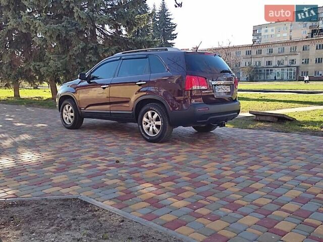 Красный Киа Соренто, объемом двигателя 2.36 л и пробегом 230 тыс. км за 12150 $, фото 3 на Automoto.ua