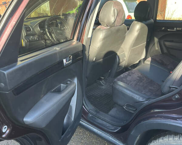 Красный Киа Соренто, объемом двигателя 2.35 л и пробегом 134 тыс. км за 11500 $, фото 2 на Automoto.ua