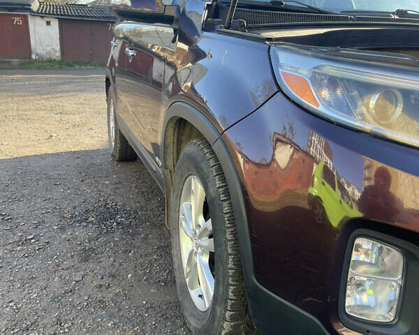 Красный Киа Соренто, объемом двигателя 2.35 л и пробегом 134 тыс. км за 11500 $, фото 13 на Automoto.ua