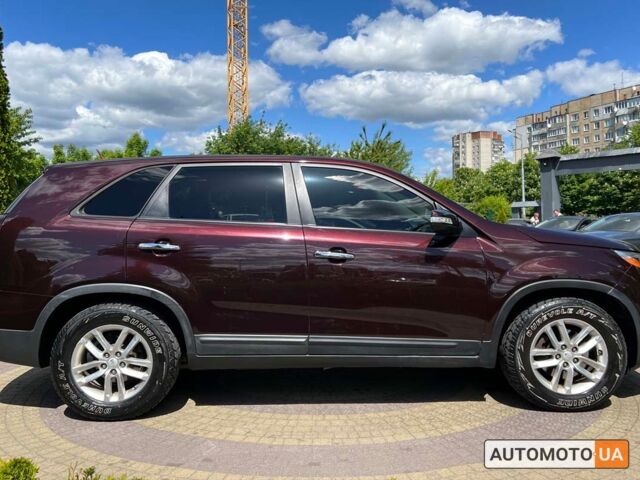 Красный Киа Соренто, объемом двигателя 2.4 л и пробегом 176 тыс. км за 11999 $, фото 7 на Automoto.ua
