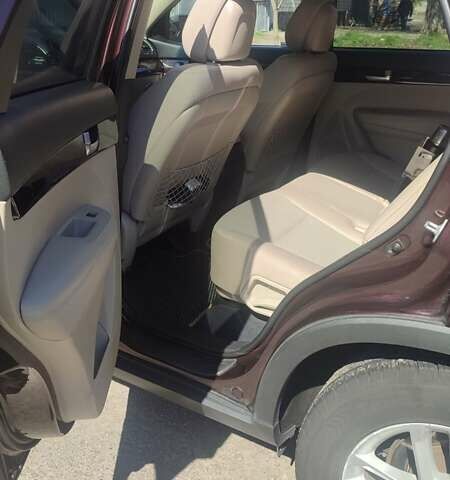 Красный Киа Соренто, объемом двигателя 2.35 л и пробегом 162 тыс. км за 14900 $, фото 5 на Automoto.ua
