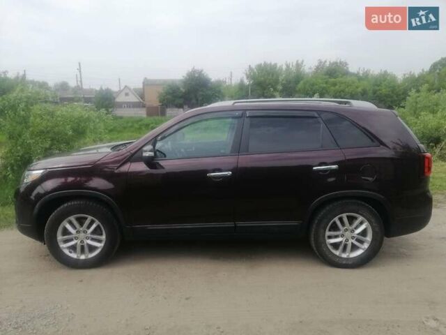 Красный Киа Соренто, объемом двигателя 2.36 л и пробегом 228 тыс. км за 11800 $, фото 3 на Automoto.ua