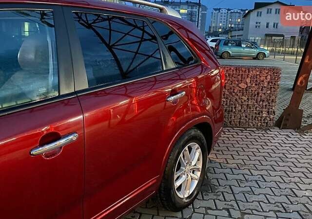 Красный Киа Соренто, объемом двигателя 2.4 л и пробегом 118 тыс. км за 12800 $, фото 3 на Automoto.ua