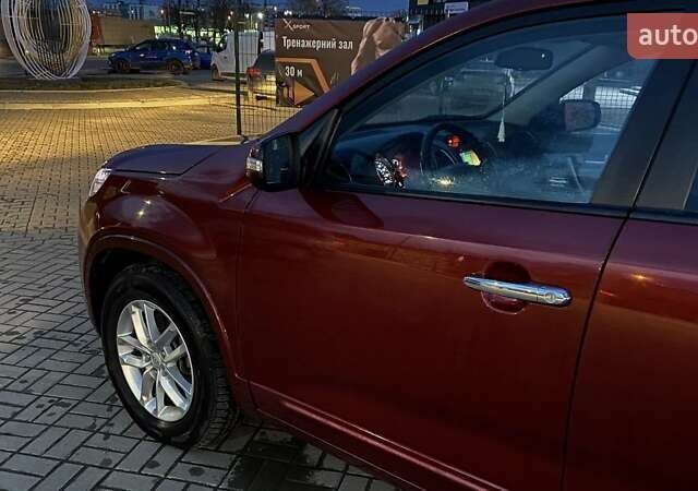 Красный Киа Соренто, объемом двигателя 2.4 л и пробегом 118 тыс. км за 12800 $, фото 2 на Automoto.ua