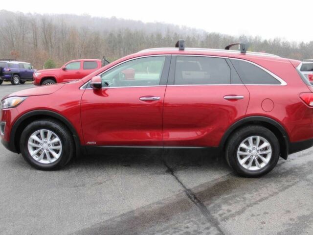 Красный Киа Соренто, объемом двигателя 2.4 л и пробегом 59 тыс. км за 6400 $, фото 4 на Automoto.ua