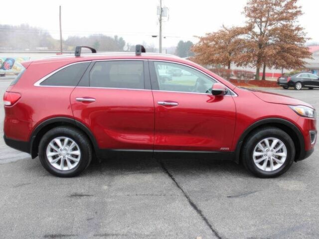 Красный Киа Соренто, объемом двигателя 2.4 л и пробегом 59 тыс. км за 6400 $, фото 3 на Automoto.ua