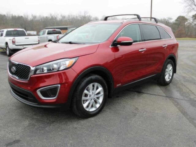 Красный Киа Соренто, объемом двигателя 2.4 л и пробегом 59 тыс. км за 6400 $, фото 2 на Automoto.ua