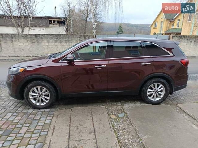 Красный Киа Соренто, объемом двигателя 2.36 л и пробегом 143 тыс. км за 16950 $, фото 2 на Automoto.ua