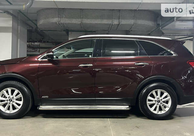 Красный Киа Соренто, объемом двигателя 2.36 л и пробегом 99 тыс. км за 18900 $, фото 6 на Automoto.ua