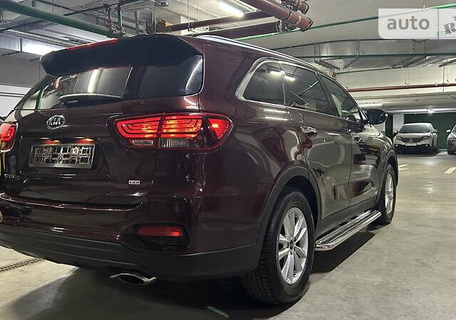 Красный Киа Соренто, объемом двигателя 2.36 л и пробегом 99 тыс. км за 18900 $, фото 11 на Automoto.ua