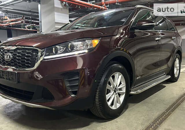 Красный Киа Соренто, объемом двигателя 2.36 л и пробегом 99 тыс. км за 18900 $, фото 5 на Automoto.ua