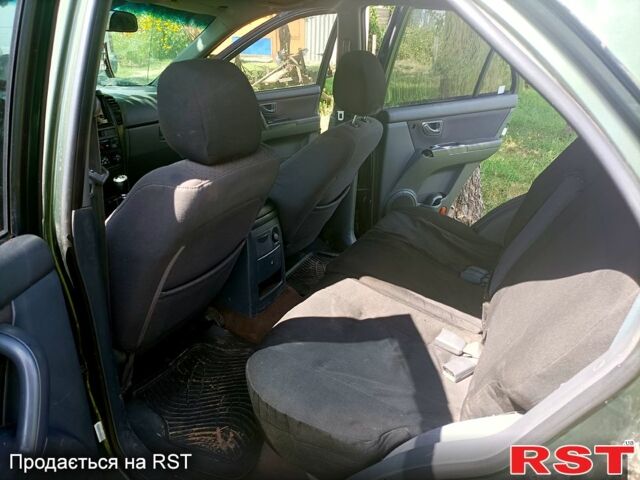 Киа Соренто, объемом двигателя 2.5 л и пробегом 0 тыс. км за 2100 $, фото 6 на Automoto.ua