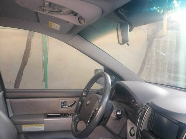 Серый Киа Соренто, объемом двигателя 2.5 л и пробегом 220 тыс. км за 7500 $, фото 5 на Automoto.ua