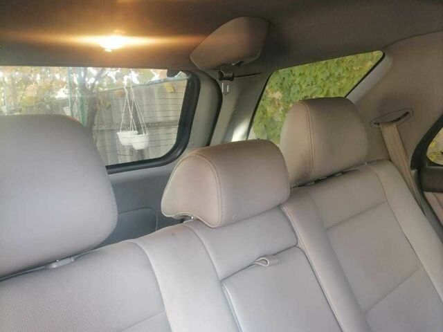 Серый Киа Соренто, объемом двигателя 2.5 л и пробегом 220 тыс. км за 7500 $, фото 6 на Automoto.ua