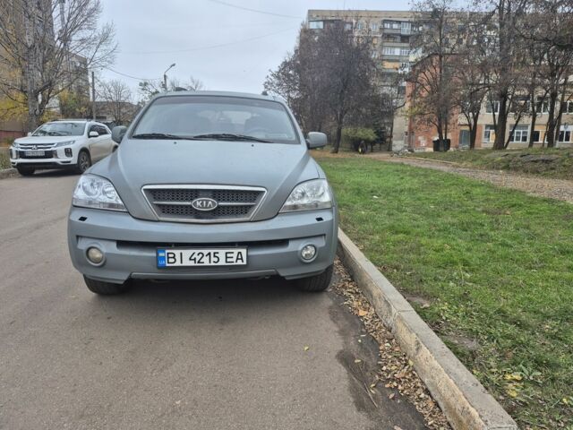 Серый Киа Соренто, объемом двигателя 2.4 л и пробегом 260 тыс. км за 4500 $, фото 1 на Automoto.ua