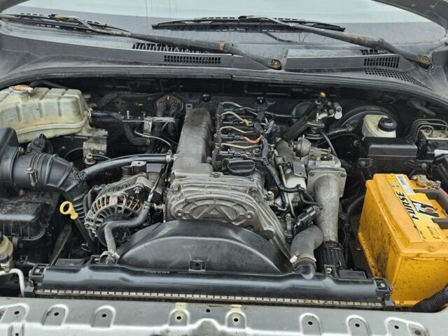 Серый Киа Соренто, объемом двигателя 2.5 л и пробегом 203 тыс. км за 3100 $, фото 9 на Automoto.ua