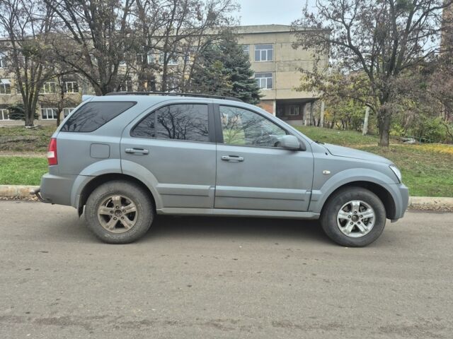 Серый Киа Соренто, объемом двигателя 2.4 л и пробегом 260 тыс. км за 4500 $, фото 2 на Automoto.ua