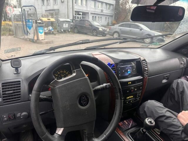 Серый Киа Соренто, объемом двигателя 2.4 л и пробегом 150 тыс. км за 5400 $, фото 4 на Automoto.ua