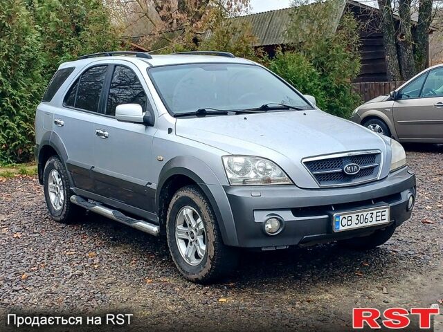 Серый Киа Соренто, объемом двигателя 2.4 л и пробегом 400 тыс. км за 5750 $, фото 2 на Automoto.ua