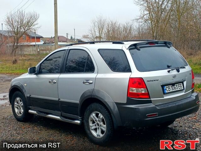 Серый Киа Соренто, объемом двигателя 2.4 л и пробегом 400 тыс. км за 5750 $, фото 4 на Automoto.ua