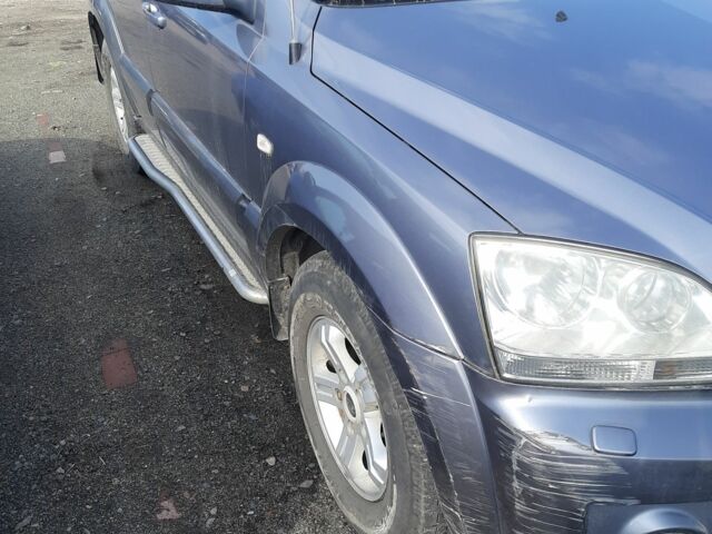 Серый Киа Соренто, объемом двигателя 2.5 л и пробегом 225 тыс. км за 7200 $, фото 1 на Automoto.ua