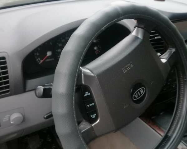 Серый Киа Соренто, объемом двигателя 2.5 л и пробегом 280 тыс. км за 4250 $, фото 9 на Automoto.ua