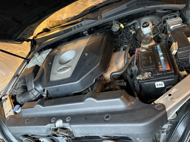 Серый Киа Соренто, объемом двигателя 2.4 л и пробегом 253 тыс. км за 6500 $, фото 6 на Automoto.ua