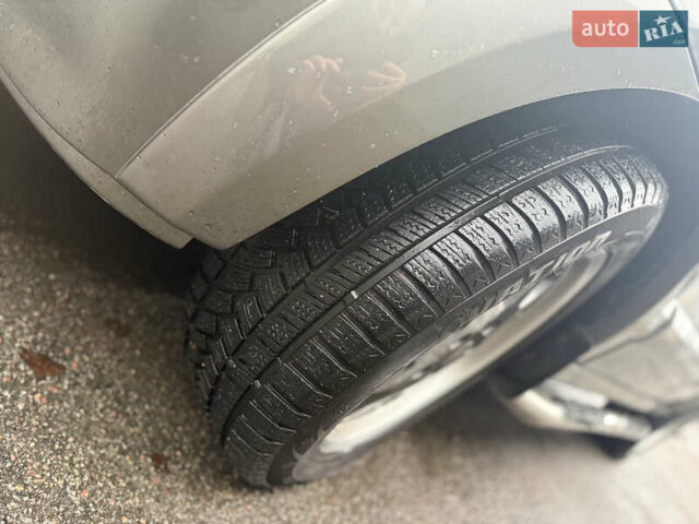 Серый Киа Соренто, объемом двигателя 2.4 л и пробегом 253 тыс. км за 6500 $, фото 3 на Automoto.ua