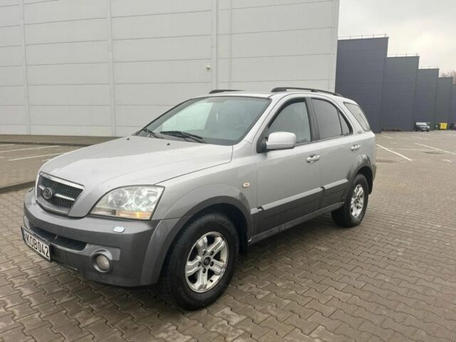 Серый Киа Соренто, объемом двигателя 2.4 л и пробегом 300 тыс. км за 4450 $, фото 1 на Automoto.ua