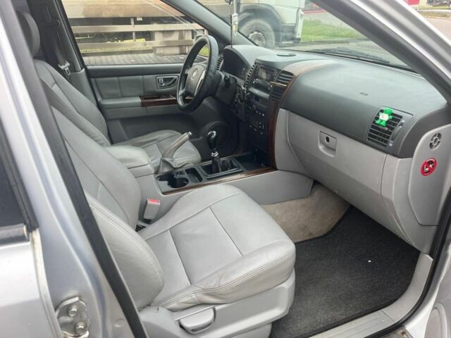 Серый Киа Соренто, объемом двигателя 2.4 л и пробегом 300 тыс. км за 4450 $, фото 7 на Automoto.ua