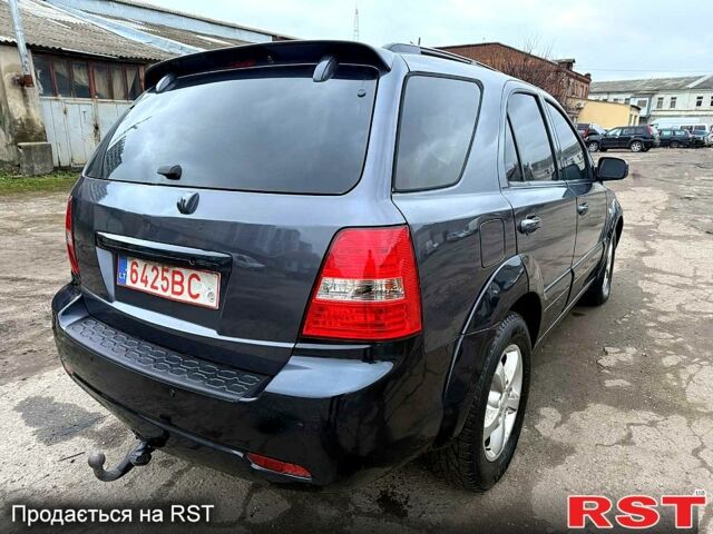 Серый Киа Соренто, объемом двигателя 2.5 л и пробегом 278 тыс. км за 4500 $, фото 5 на Automoto.ua