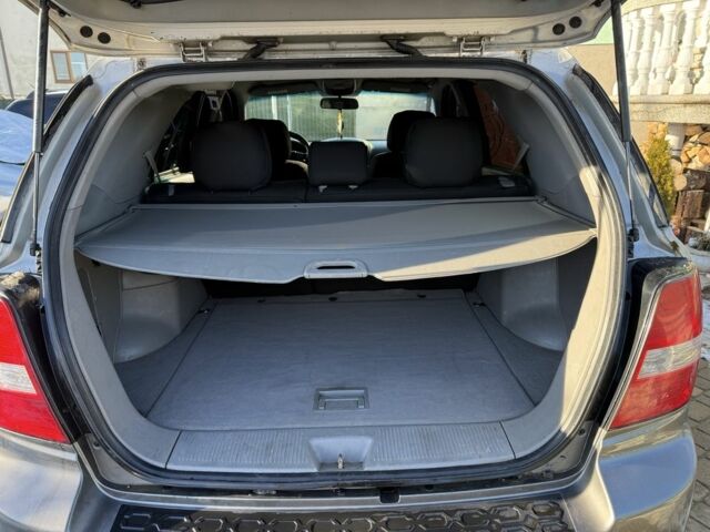 Серый Киа Соренто, объемом двигателя 2.5 л и пробегом 230 тыс. км за 7300 $, фото 4 на Automoto.ua