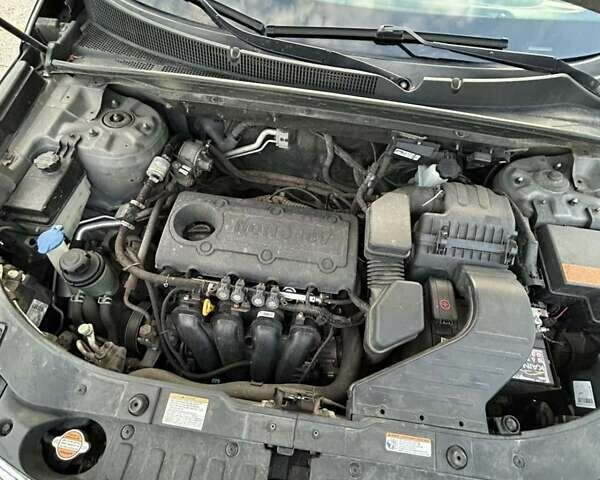 Серый Киа Соренто, объемом двигателя 2.4 л и пробегом 260 тыс. км за 11500 $, фото 14 на Automoto.ua