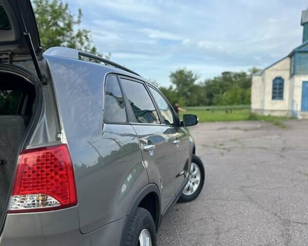 Серый Киа Соренто, объемом двигателя 2.4 л и пробегом 260 тыс. км за 11500 $, фото 30 на Automoto.ua