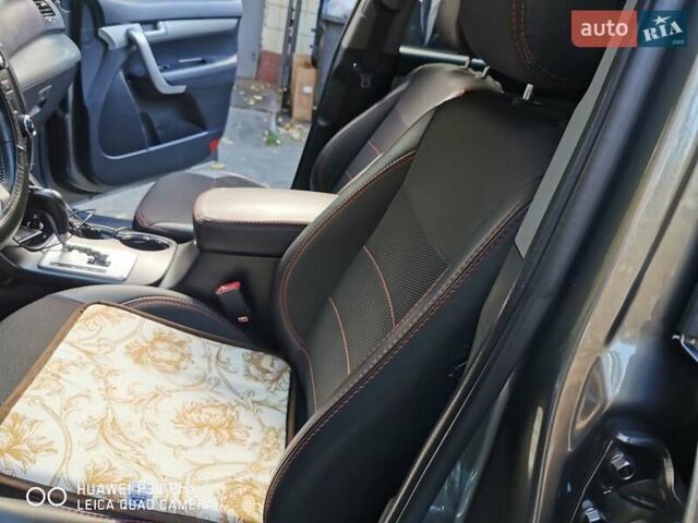 Серый Киа Соренто, объемом двигателя 2.4 л и пробегом 277 тыс. км за 11300 $, фото 11 на Automoto.ua