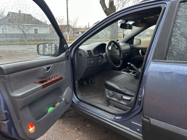 Синий Киа Соренто, объемом двигателя 2.5 л и пробегом 230 тыс. км за 4200 $, фото 8 на Automoto.ua