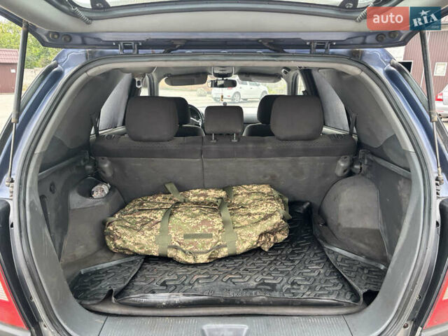 Синий Киа Соренто, объемом двигателя 2.5 л и пробегом 300 тыс. км за 4200 $, фото 20 на Automoto.ua