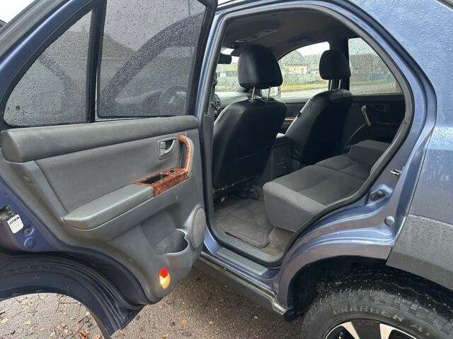 Синий Киа Соренто, объемом двигателя 2.5 л и пробегом 230 тыс. км за 4200 $, фото 9 на Automoto.ua