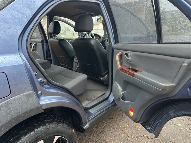 Синий Киа Соренто, объемом двигателя 2.5 л и пробегом 230 тыс. км за 4200 $, фото 10 на Automoto.ua