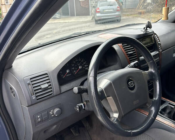 Синий Киа Соренто, объемом двигателя 2.5 л и пробегом 300 тыс. км за 4200 $, фото 11 на Automoto.ua