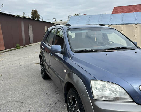 Синий Киа Соренто, объемом двигателя 2.5 л и пробегом 300 тыс. км за 4200 $, фото 1 на Automoto.ua