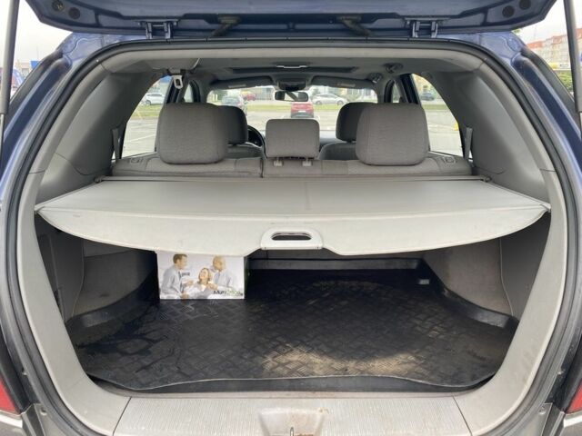 Синій Кіа Соренто, об'ємом двигуна 2.5 л та пробігом 318 тис. км за 3400 $, фото 3 на Automoto.ua