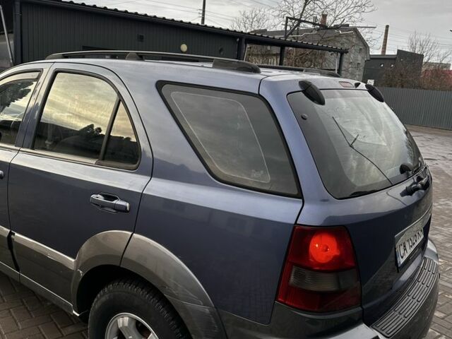 Синій Кіа Соренто, об'ємом двигуна 2.5 л та пробігом 300 тис. км за 2600 $, фото 3 на Automoto.ua